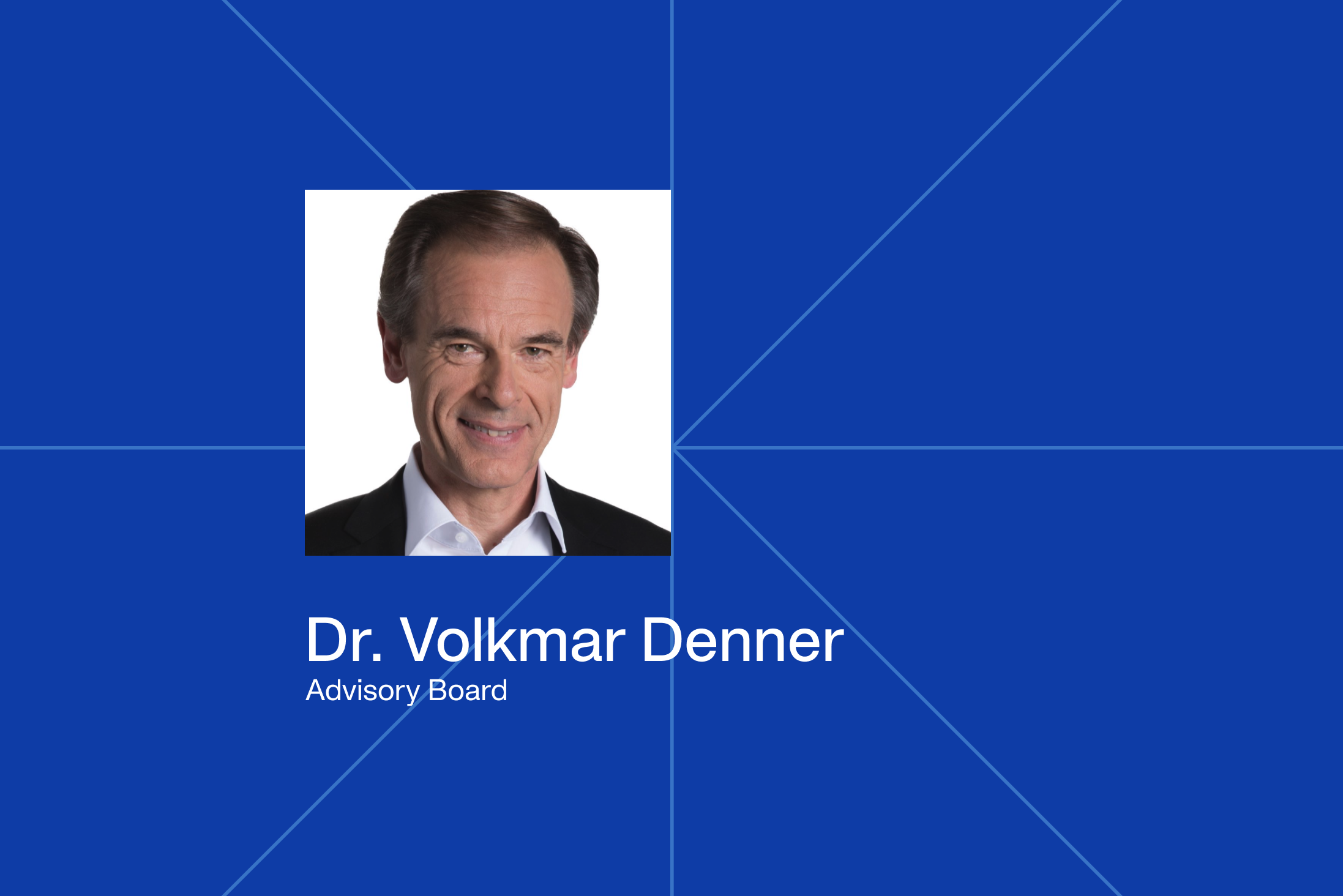 Portrait of Dr. Volkmar Denner, Advisory Board member, on a blue background